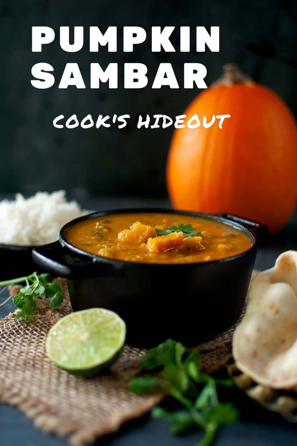 Black pan with roasted pumpkin sambar