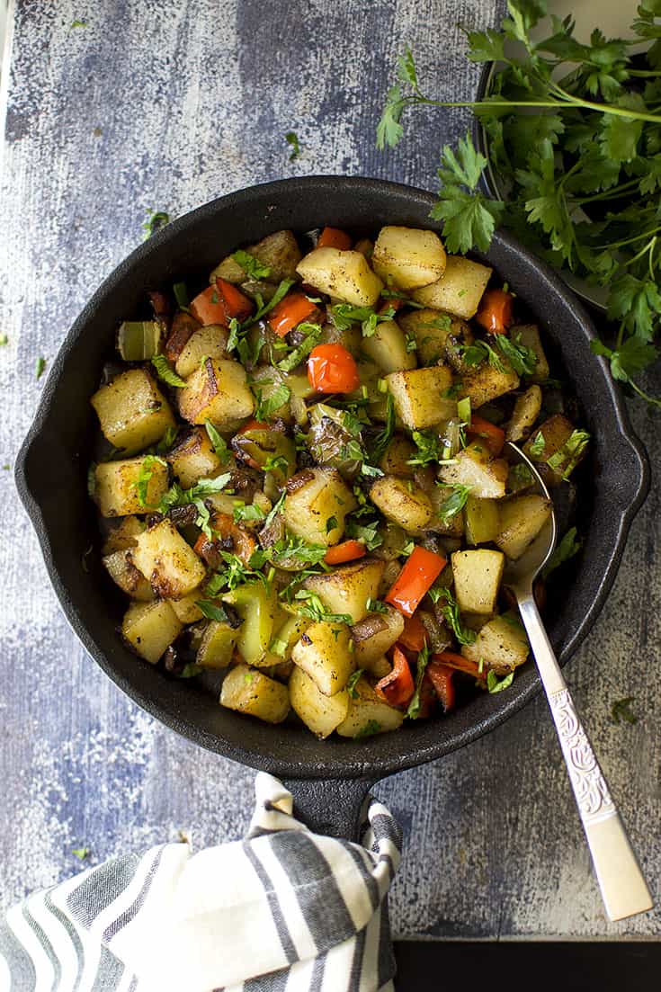 Italian Fried Potatoes and Peppers in a Cast iron skillet