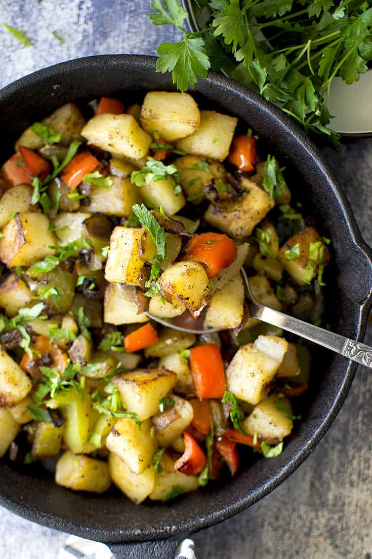 Cast Iron skillet with Italian potatoes and peppers