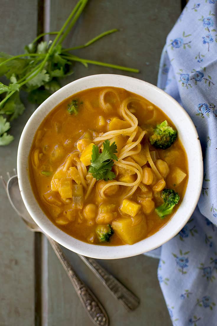 Bowl of Thai Curry soup with noodles and broccoli