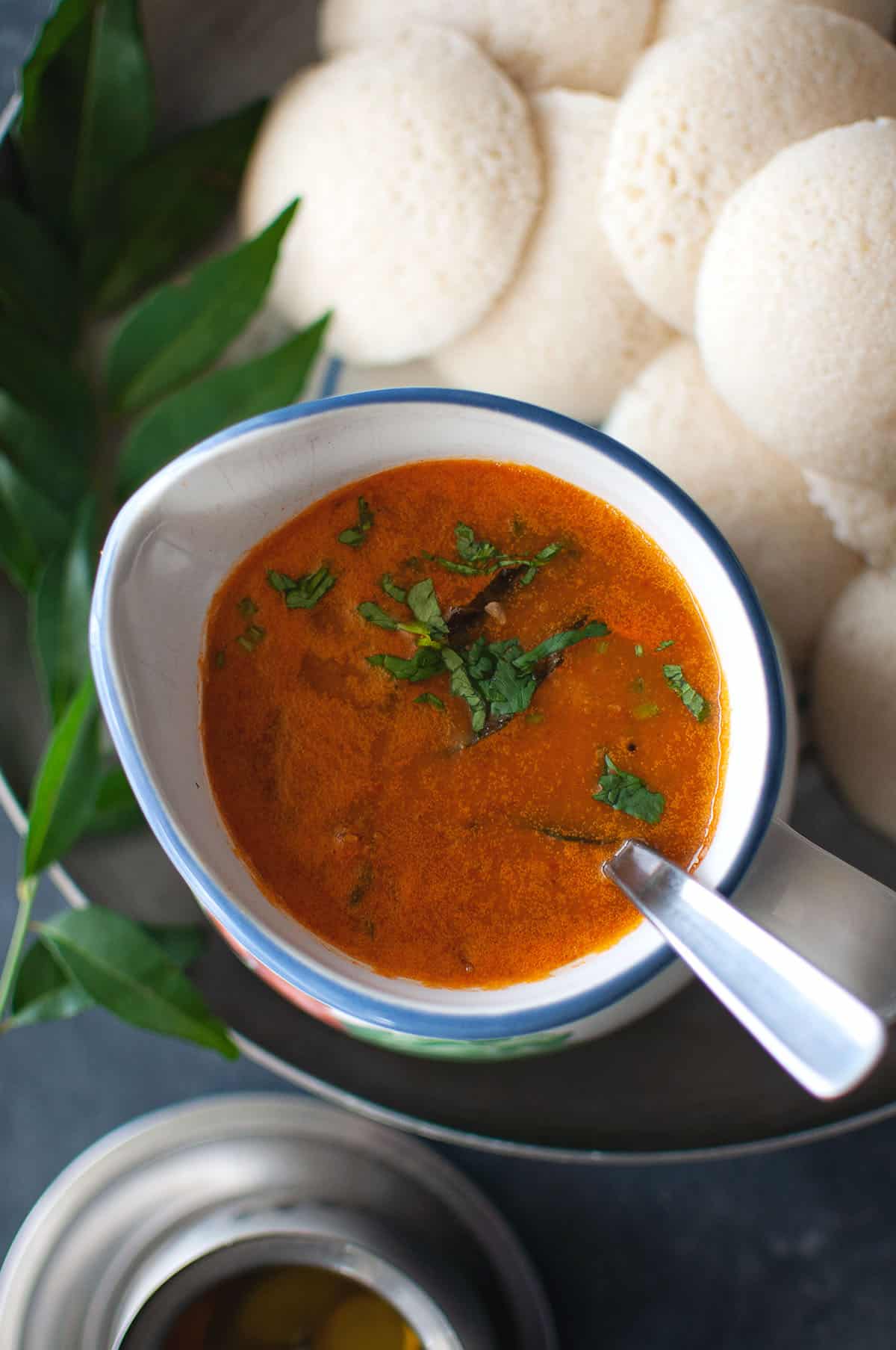 Top view of a white bowl with Instant sambar.