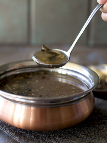 Copper bottom bowl with Pepper rasam.