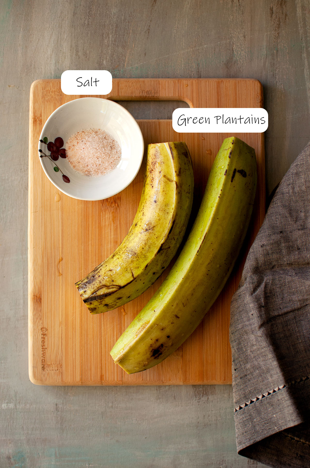 Ingredients needed to make tostones, details in recipe card.