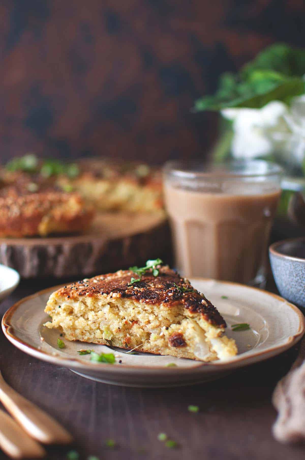 Brown plate with a slice of Ondhwa.