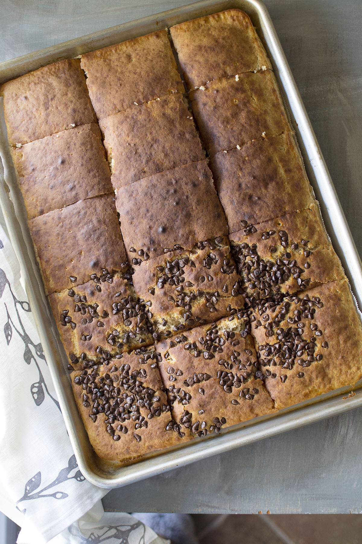 Baking sheet with pancakes topped with mini chocolate chips 