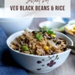 Grey bowl with Instant Pot black beans and rice.