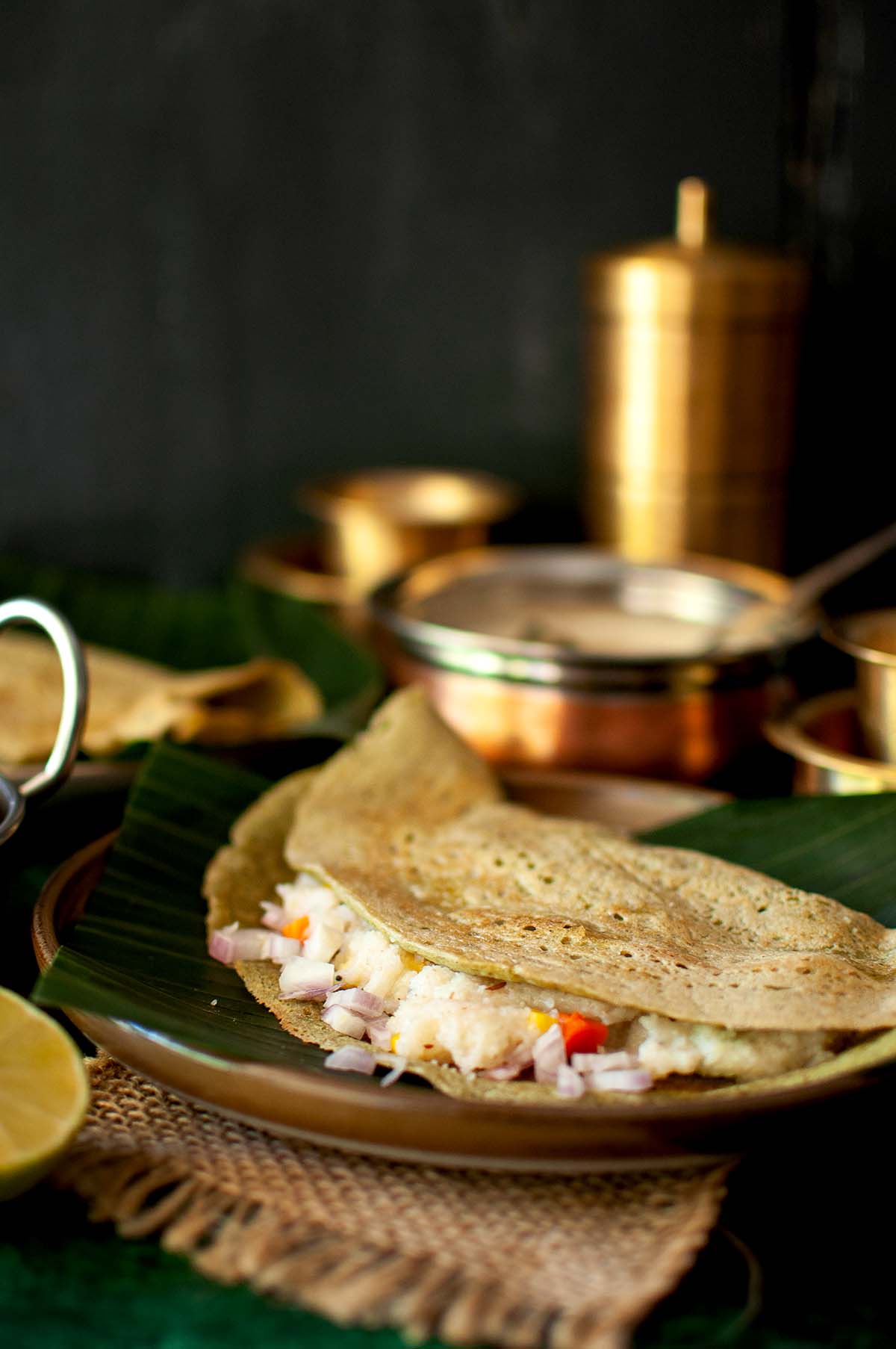 Plate with upma filled dosa.