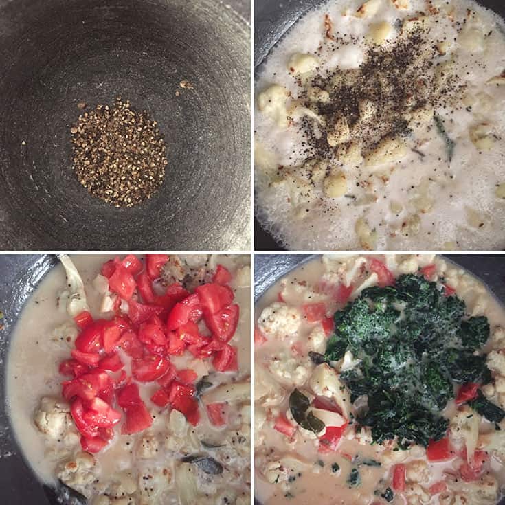 Freshly ground black peppercorns being added to the dish along with tomatoes and spinach